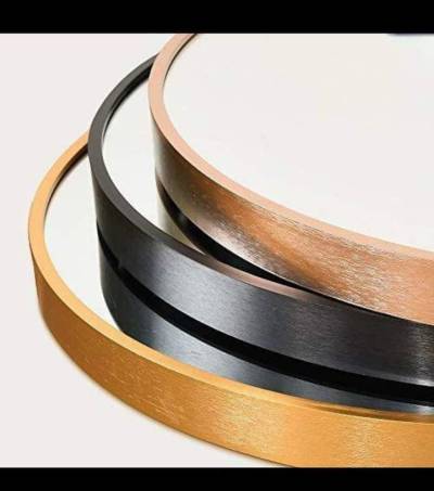 round aluminium framed mirror image